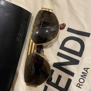 Fendi unisex Sunglasses with Gold Frame and Dark Lenses